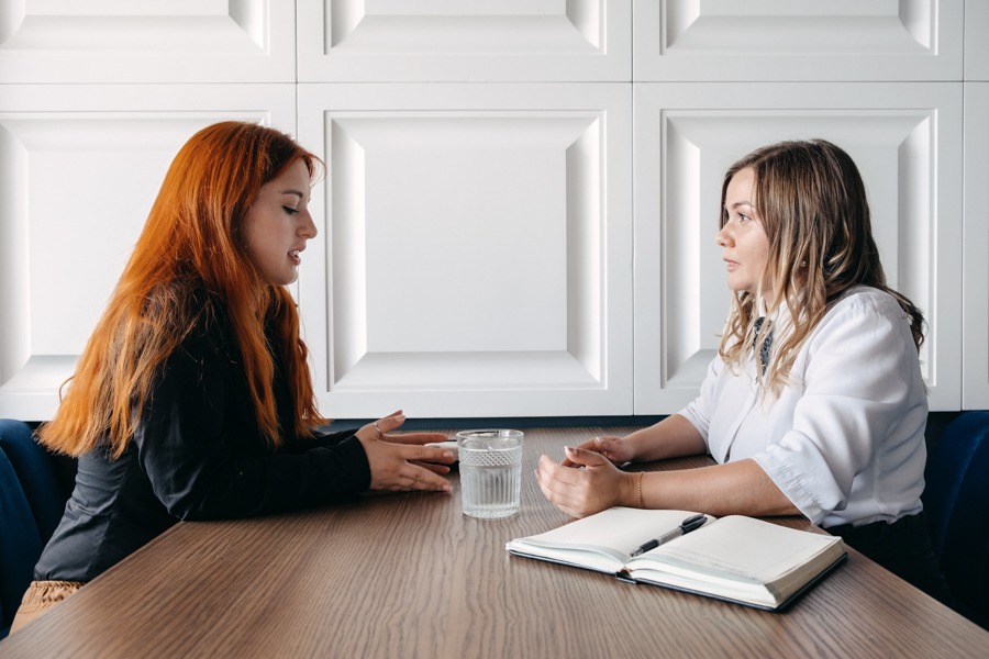 patient on a recovery during the holidays talking to therapist