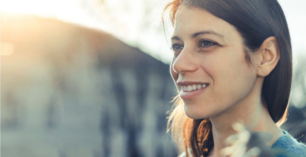 woman smiling in addiction recovery