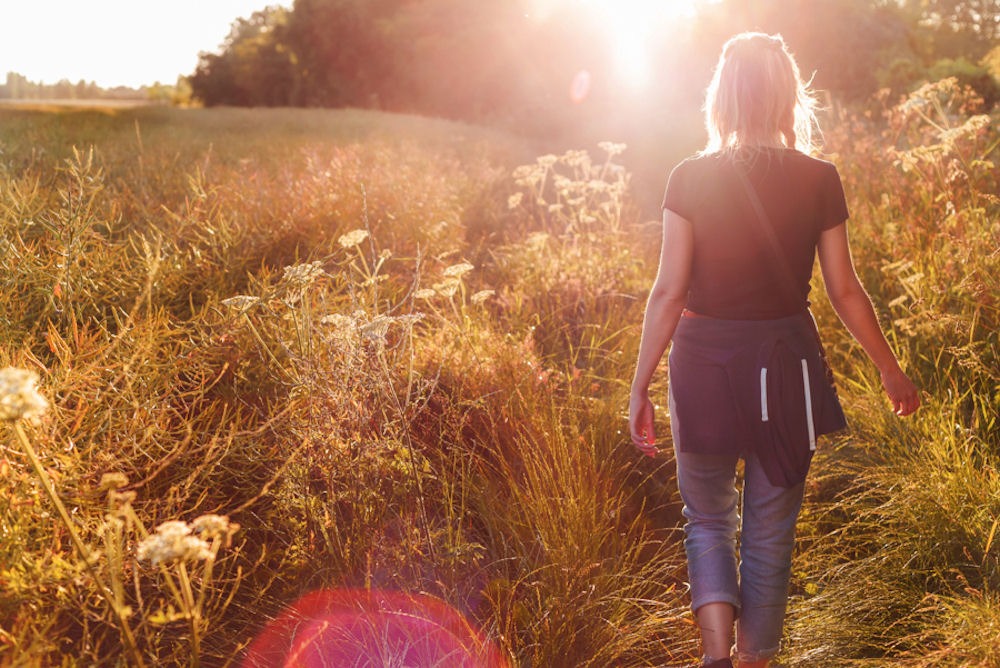 woman walking in field