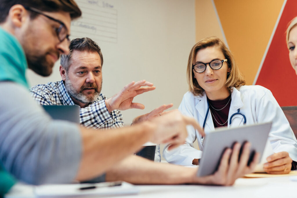 medical team discussing differences between methamphetamines and amphetamines