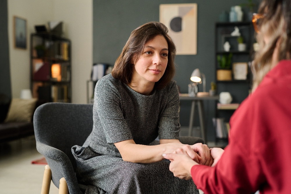 counseling-session-with-female-therapist-holding-h-2025-03-18-22-20-17-utc (1) woman speaking with therapist