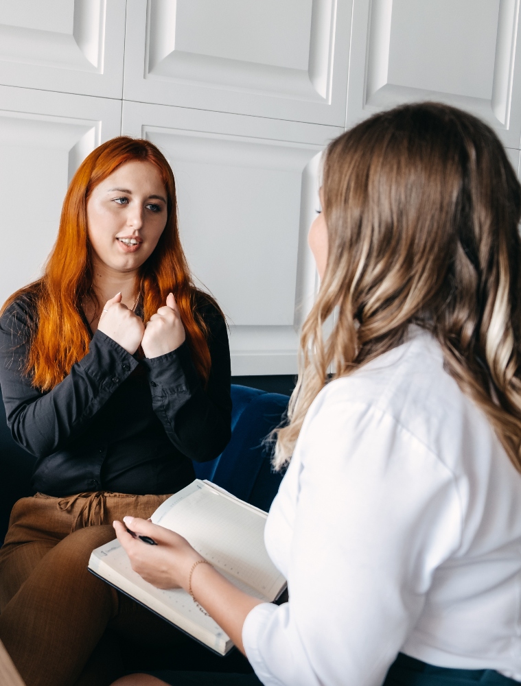 mental-health-concept-communication-session-of-wo-2025-03-12-20-58-13-utc (1) woman speaking with therapist about addiction in colorado