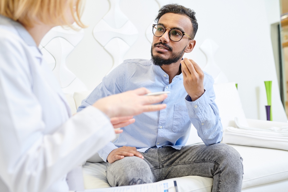 discussing-diagnosis-with-doctor-2025-03-09-07-58-04-utc (1) man talking to therapist
