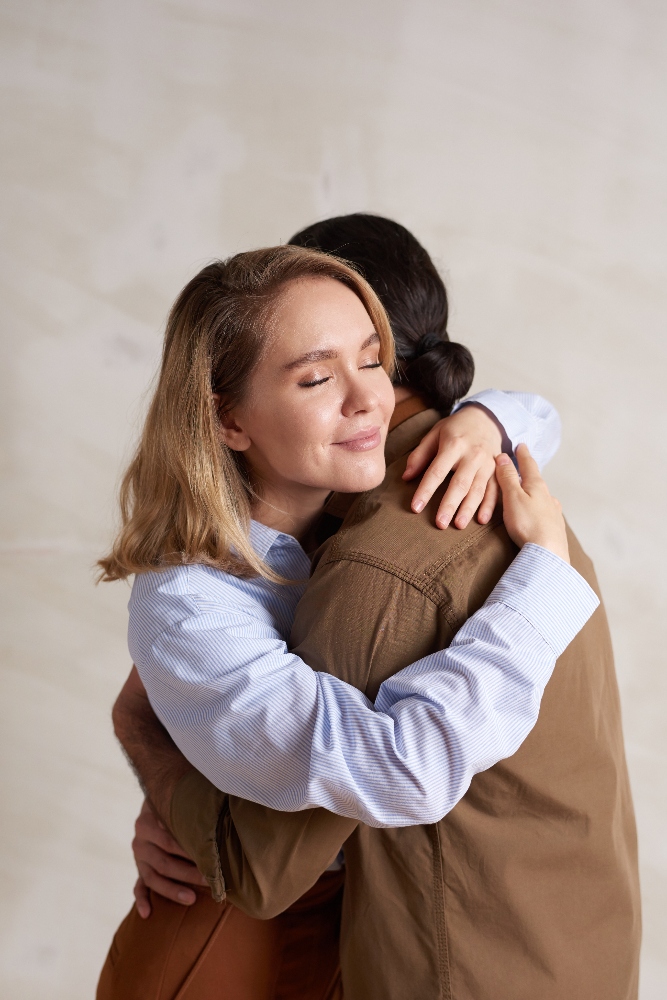 girl-embracing-her-boyfriend-2025-03-18-22-13-19-utc (1) family members hugging