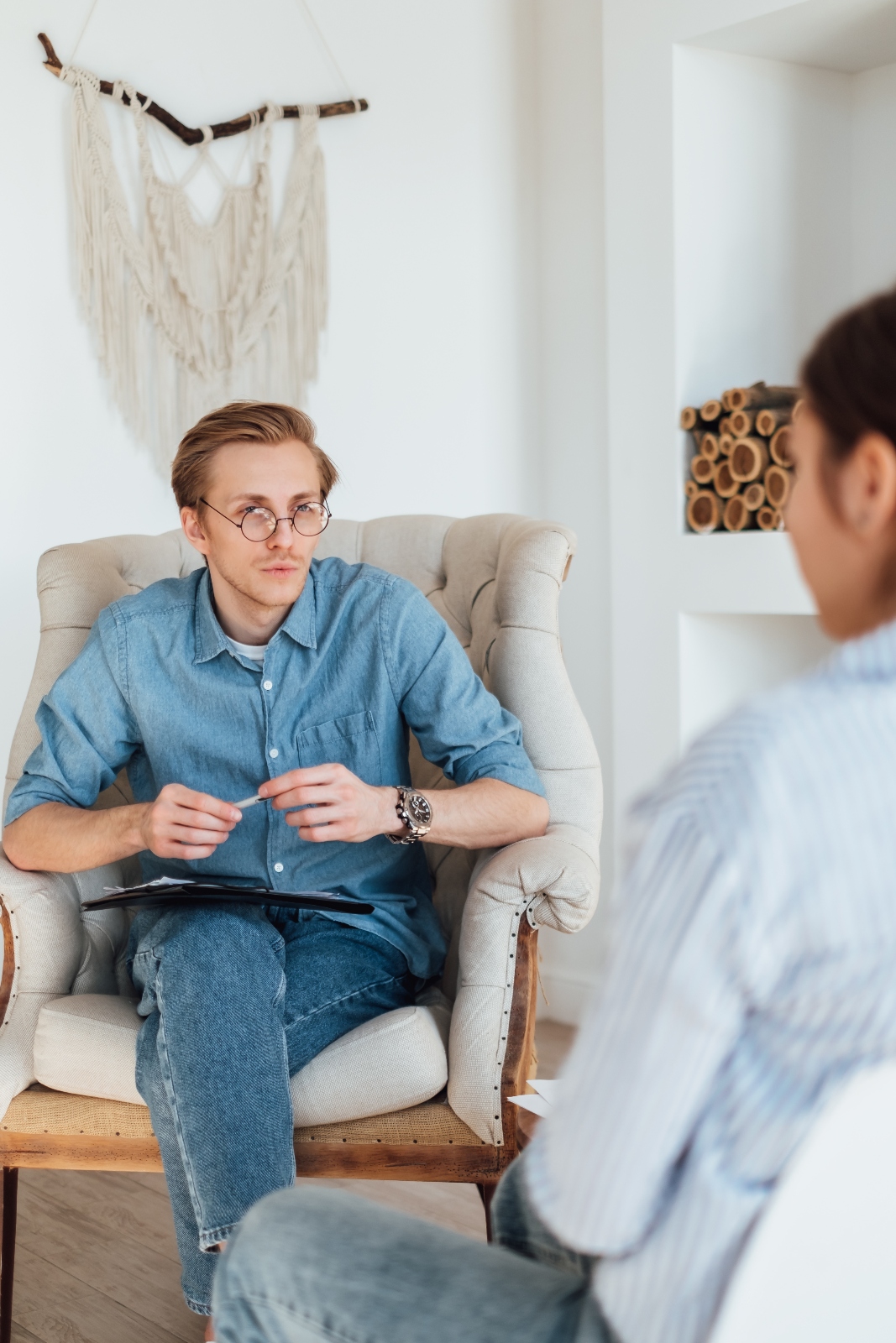 caucasian-man-psychologist-in-eyeglasses-sitting-i-2024-11-27-22-29-24-utc (1) man meeting with therapist dbt therapy